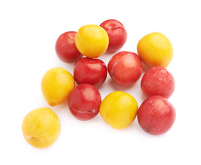 Pile of yellow and red plums