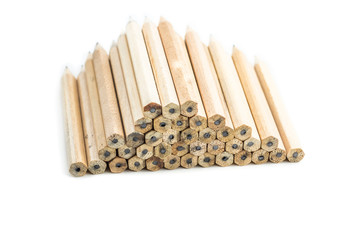 Close up of pencils with different color over white background.