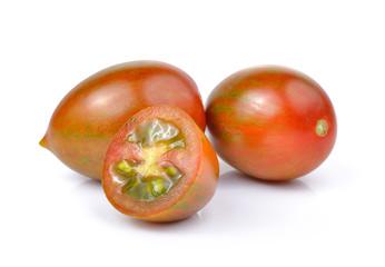 Tomato or Brown color tomato on white background