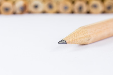 Close up of pencils with different color over white background.