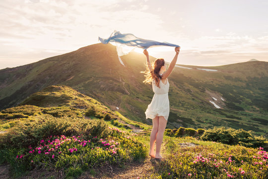 Woman feel freedom and enjoying the nature