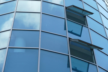  Reflection in windows of modern office building