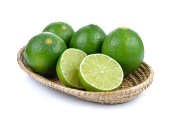 lime in the basket on white background