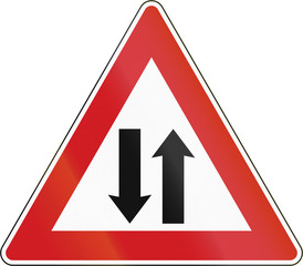 Czech sign warning about opposing traffic on a two-way road