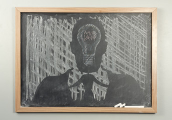 Chalkboard Businessman Lightbulbs