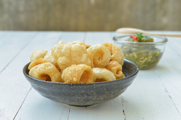 Pork rinds also known as chicharon or chicharrones, deep fried p