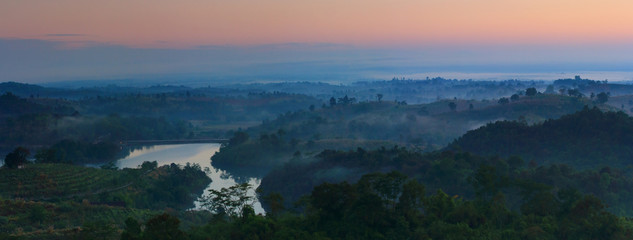 Colorful autumn panorama of the mountains. Sunrise