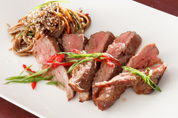 steak with noodles