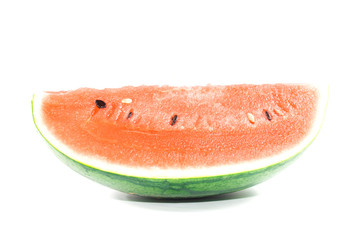 Closeup of watermelon (whole and slice) on white background
