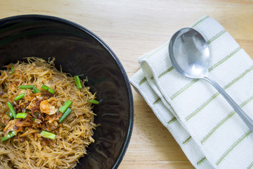 Thai- style noodles and fried garlic,leeks with Pork bone soup f