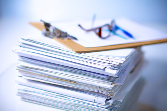 Big stack of papers ,documents on the desk