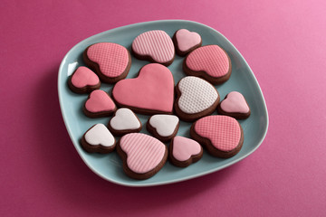 Heart shaped valentine cookies on plate