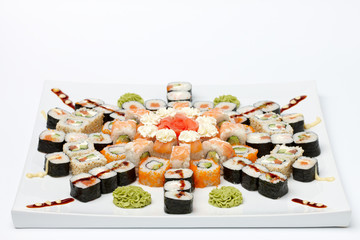 Sushi on white plate.