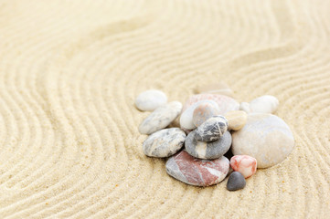 Group stones on the sand