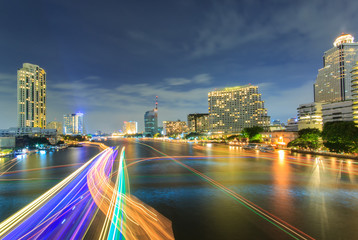 Fototapeta premium Beautiful night city bangkok with speed light on river