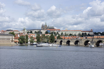 Fototapeta premium Spring Prague gothic Castle with the Charles Bridge