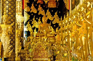 Rolgordijnen Golden buddha statue in buddhism temple thailand  © tyodwong