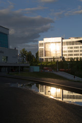 Fototapeta na wymiar Sunlight Reflects from a Modern Building