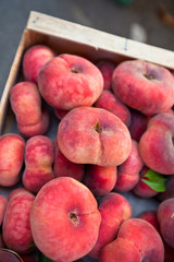 Fresh peaches selling in a market