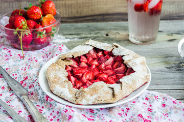 biscuit with fresh strawberries on the dough of cottage cheese