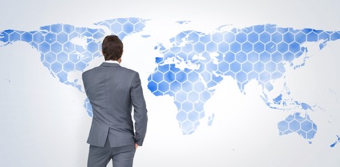 Composite image of thinking businessman