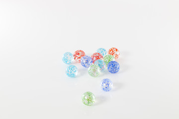 coloured marbles isolated on white background