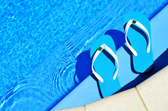 flip-flops on the swimming pool