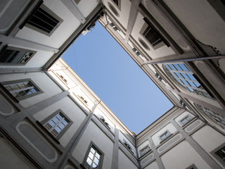Fototapeta premium Above us only sky. Italian architecture detail, Pontremoli, Italy.