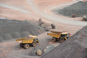 dumper trucks parking in a surface mine. © lcrms