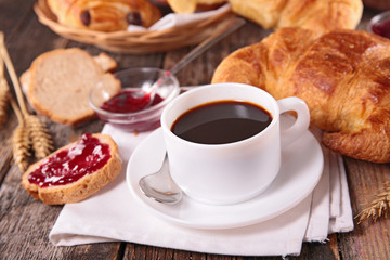 coffee cup and croissant