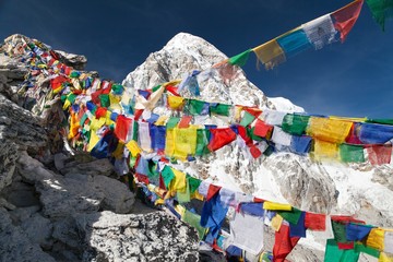 view of Mount Pumo Ri with buddhist prayer flags