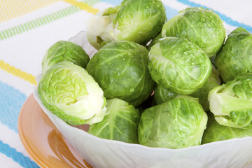 Fototapeta premium Bowl of Brussels Sprouts – A bowl of steamed Brussels sprouts.