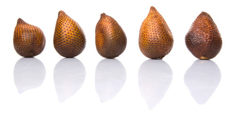Salak fruit or snake fruits over white background
