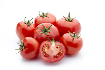 Tomato on the white isolatd background.