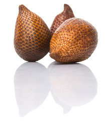 Salak fruit or snake fruits over white background