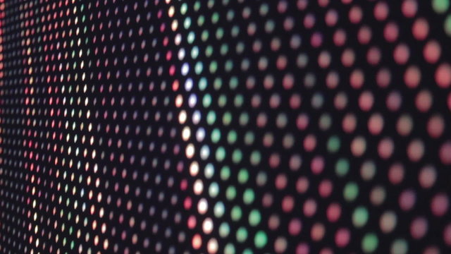 Colorful LED light wall at nightclub, music video background