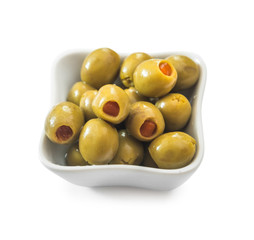 Green olives in white bowl