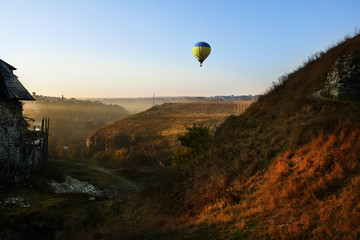 Fototapeta na wymiar balloon silhouette with sunrise