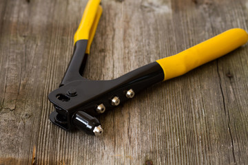 rivet pilers on wood