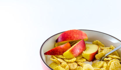Breakfast with cornflakes on the white background