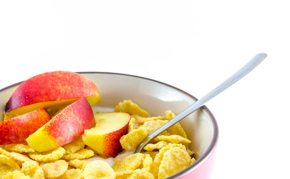 Breakfast with cornflakes on the white background