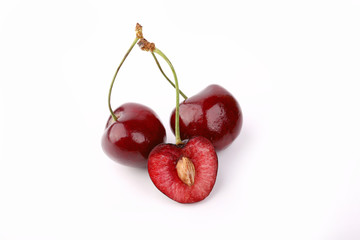 cherry isolated on white background cut stone