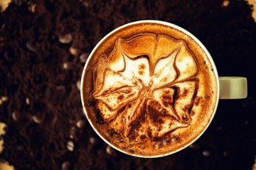 coffee mocha hot and coffee beans on brown background