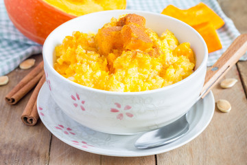 Pumpkin porridge with rice, milk and cinnamon