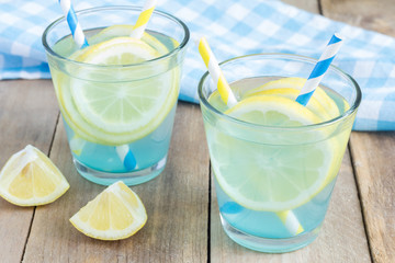 Blue lemonade with fresh lemons