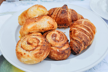 Puff crispy rolls on a white plate