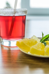 Bright red fruit drink and dessert.