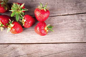 strawberries on a wooden table