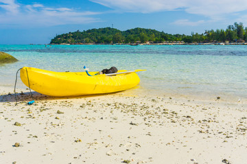 Yellow kayak on the sea. Kayaking on island
