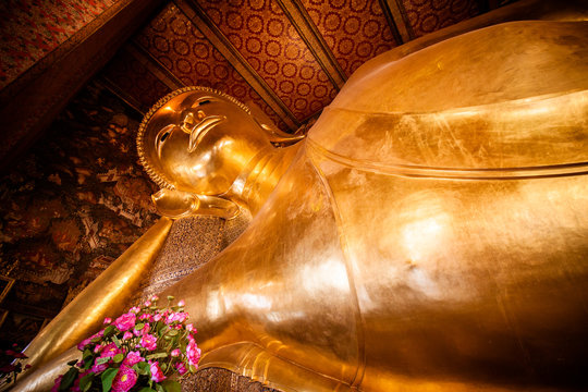 The image of golden reclining Buddha at Wat Pho Temple Thailand